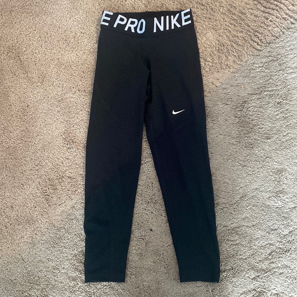 NikePro black capri leggings, Size XS, Mesh on the bottoms